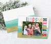 colorful holiday photo card with a single photo, multi-color text, and a watercolor teal and gold background