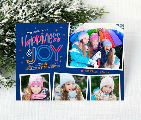 bright holiday photo card with royal blue background four photos, fun fonts and colorful text 