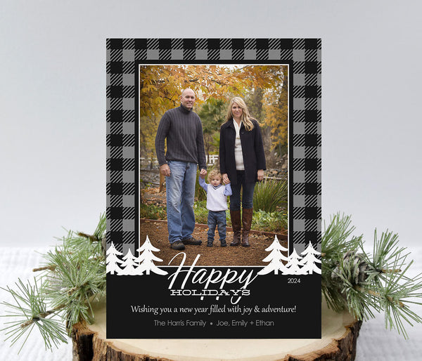 portrait style christmas photo card with gray and black buffalo check background, a single photo, white pine tree and text accents