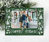 single photo christmas card with a green and white border of holiday themed graphics