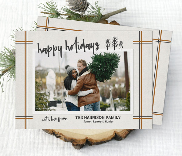 neutral holiday card design with single photo, pinstriped corners, and line drawn tree details on a beige background with black wording