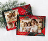 landscape oriented holiday card with a single photo, thin border, ribbon detail and red and green plaid background