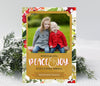 christmas or holiday photo card in portrait orientation featuring a painted red and green holly background, gold frame and a single photo