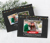 christmas photo card with black chalkboard background, single photo, and red and green holiday light strings along top