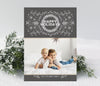 simple holiday christmas card in modern minimalist style with a single photo, gray background and white colored line drawn foliage