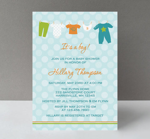 boy baby shower invitation with light blue polka dot background, teal text, clothesline of baby laundry along top in orange, white, green and teal