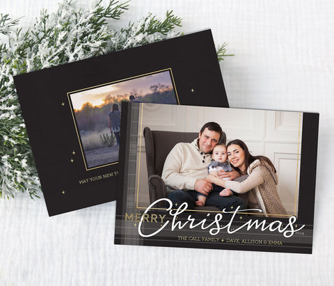 christmas photo card with single landscape photo, black background, and gray plaid stripes along edge, gold accents