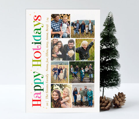 vertical holiday card with 8 photos stacked on right side and rainbow colored holiday wording along the left side. 