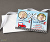 train themed joint birthday invitation for two kids, blue background with red train, crossing sign and tracks, two photos, printed on cardstock