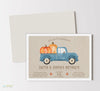 birthday invitation for two children with brown burlap patterned background, vintage blue truck and pumpkin graphics, striped back side