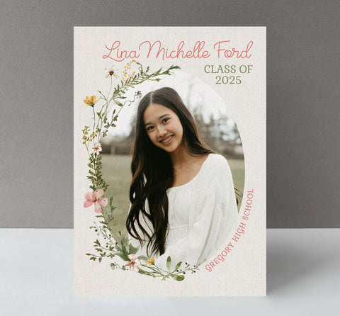 girls graduation invitation with a single oval photo framed with wildflowers