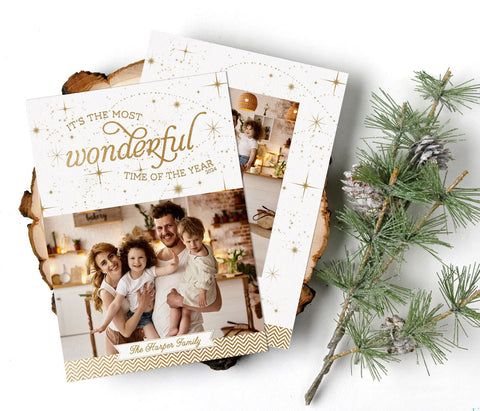 white and gold christmas photo card in a portrait orientation with a single photo and gold text and stars