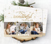 white and gold christmas photo card in a landscape orientation with 3 photos and gold text and stars