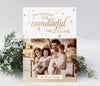 white and gold christmas photo card in a portrait orientation with a single photo and gold text and stars